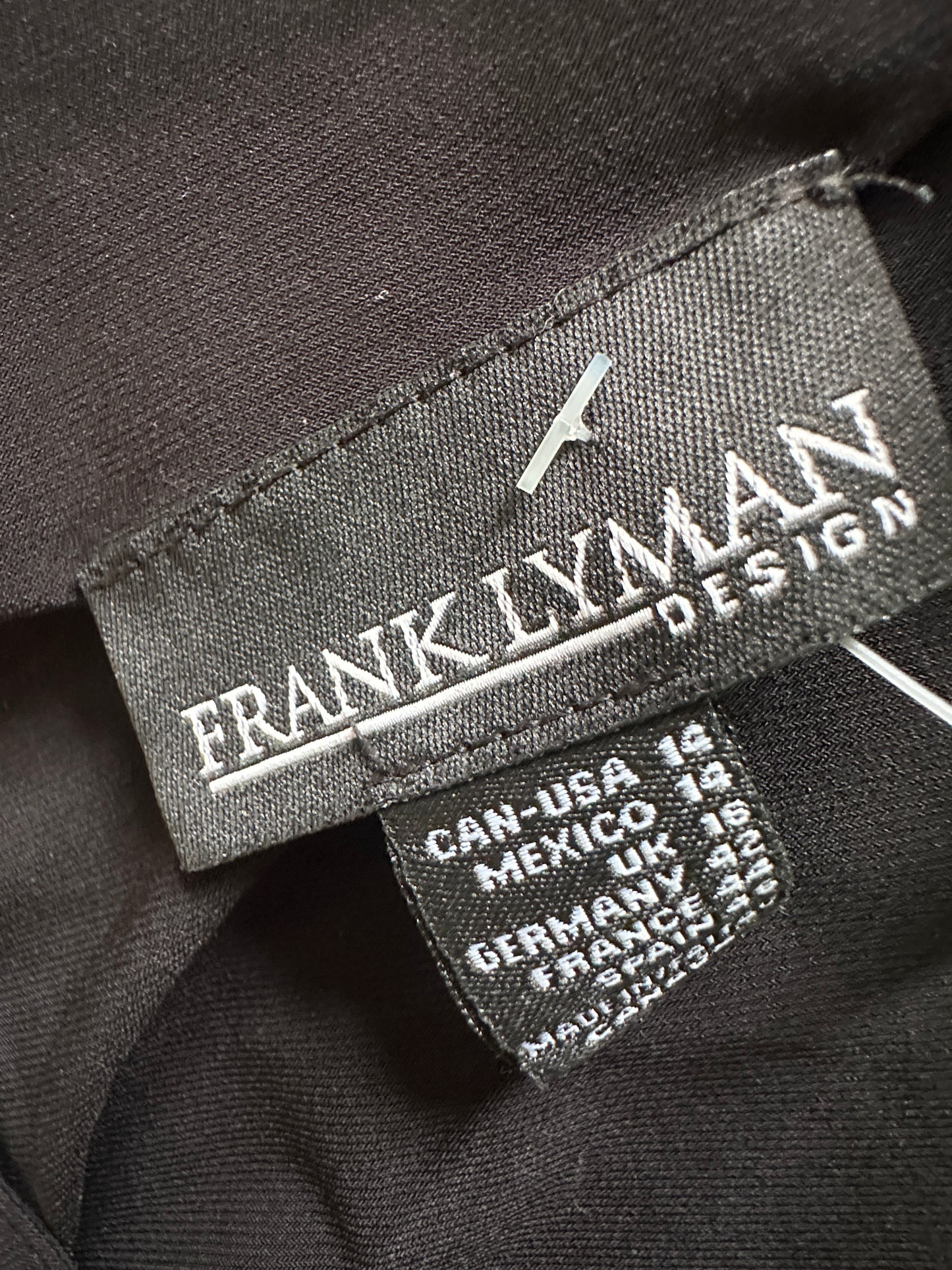 Frank Lyman top L